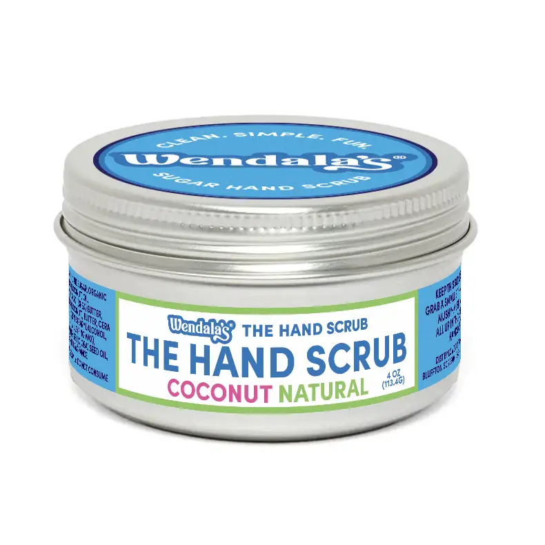 Wendala’s coconut hand scrub in a silver tin with blue and green labeling from the peach me a coconut hand scrub collection