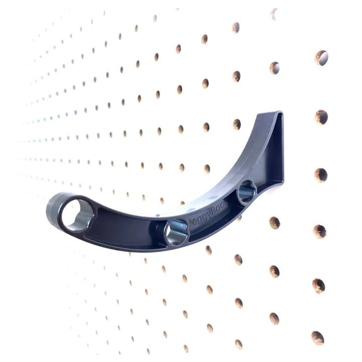 Black curved wall-mounted hook with three circular openings for hanging on peggy pegboard organizer in craft rooms