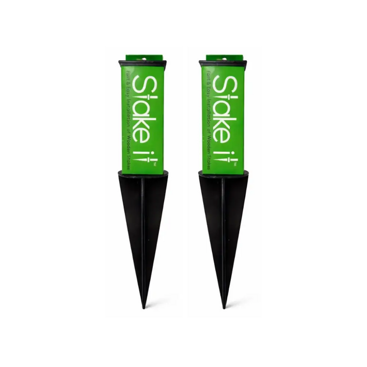 Two black plastic no-dig garden trellis anchors with green labels for easy installation of wood stake ground stabilizers