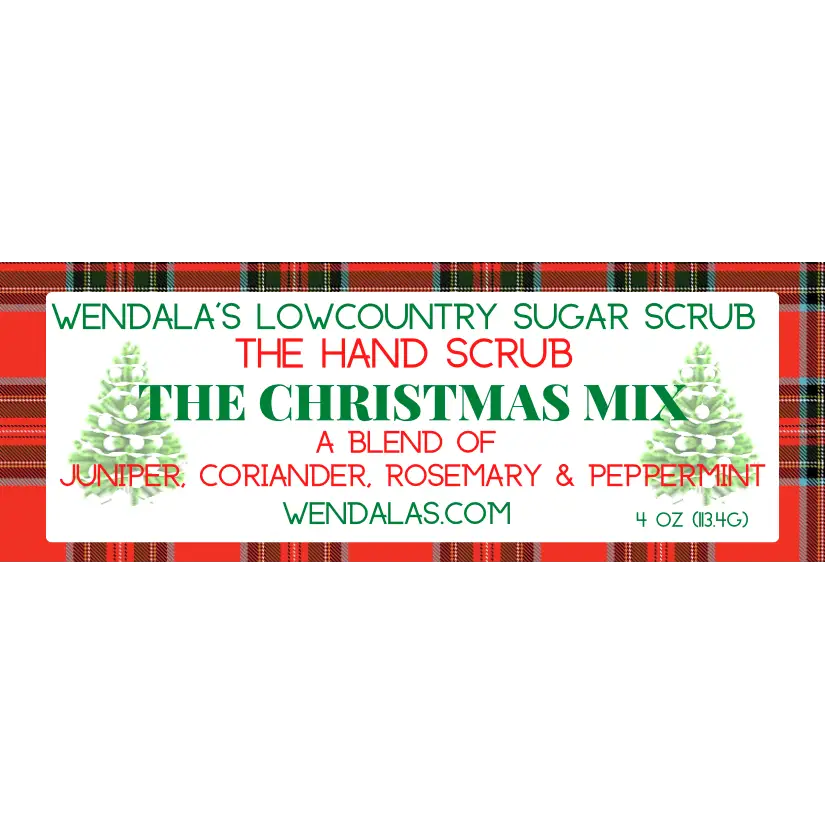The christmas mix sugar hand scrub with festive green pine tree label and juniper coriander rosemary peppermint blend