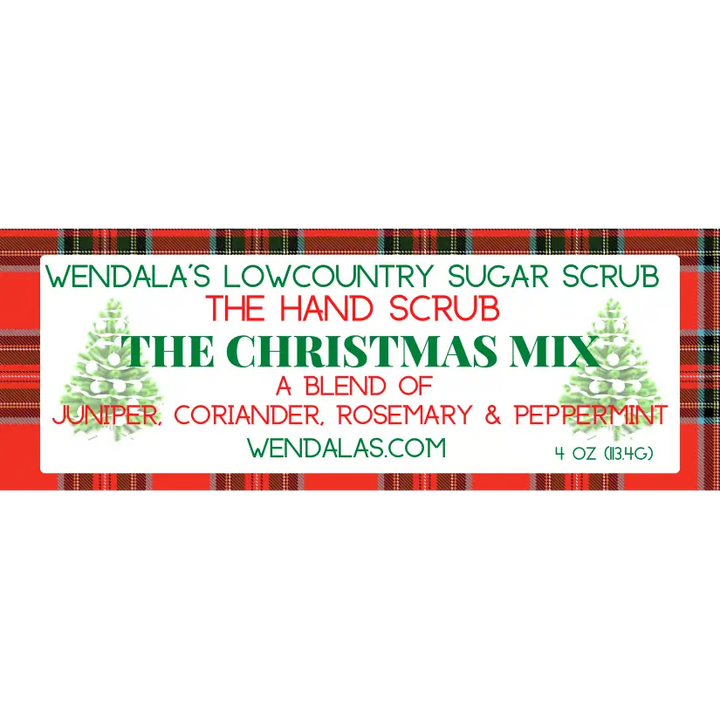 The christmas mix sugar hand scrub with festive green pine tree label and juniper coriander rosemary peppermint blend