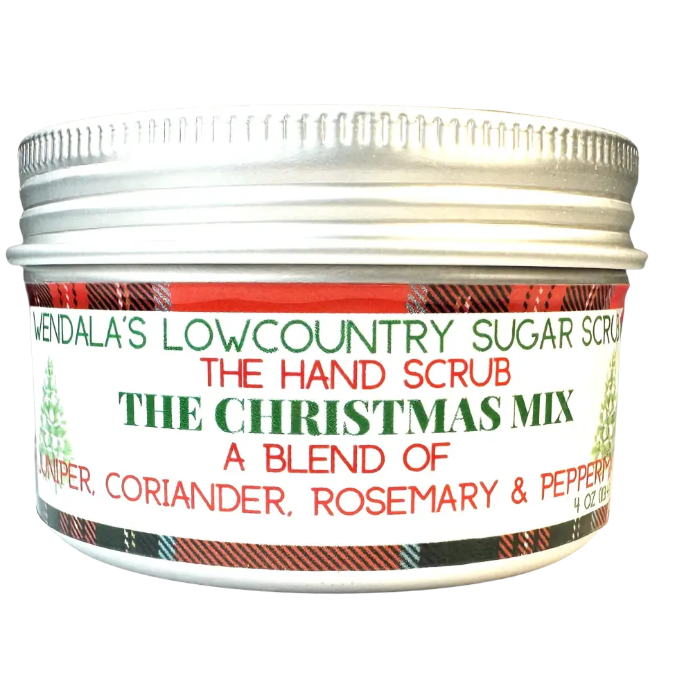 A festive silver-lidded jar of wendala lowcountry sugar hand scrub with a red and green plaid christmas mix label