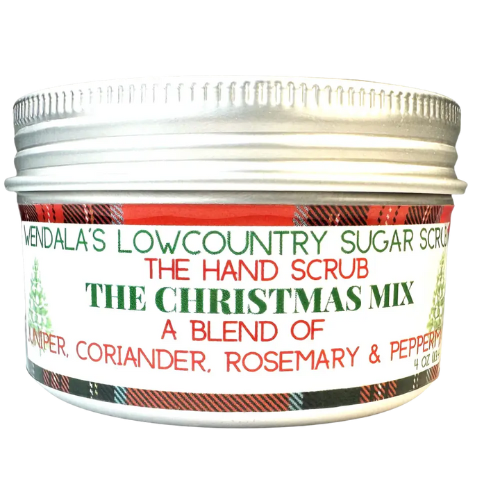 A festive silver-lidded jar of wendala lowcountry sugar hand scrub with a red and green plaid christmas mix label