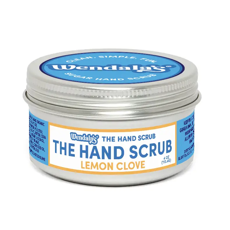 Wendala’s lemon clove sugar hand scrub in a silver tin with blue and white label from the essential hand scrub bundle