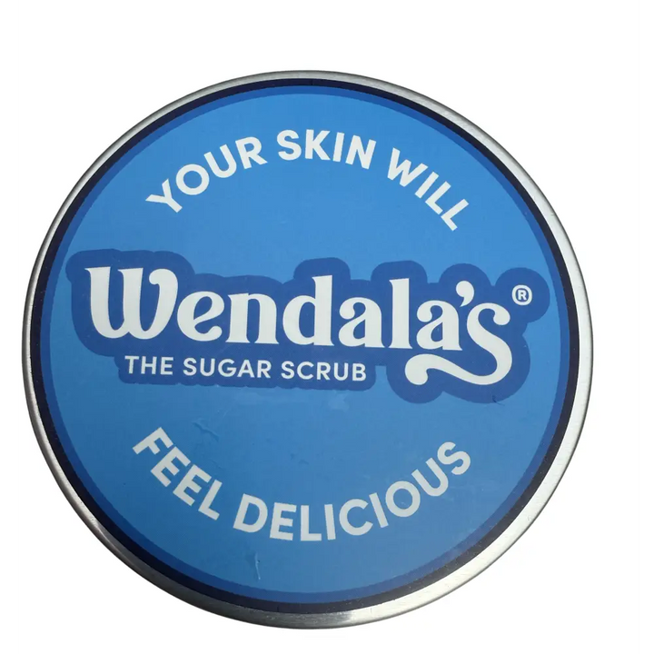 Blue circular tin of wendala’s hand scrub coconut peach with organic coconut sugar scrub and silver rim and white lettering