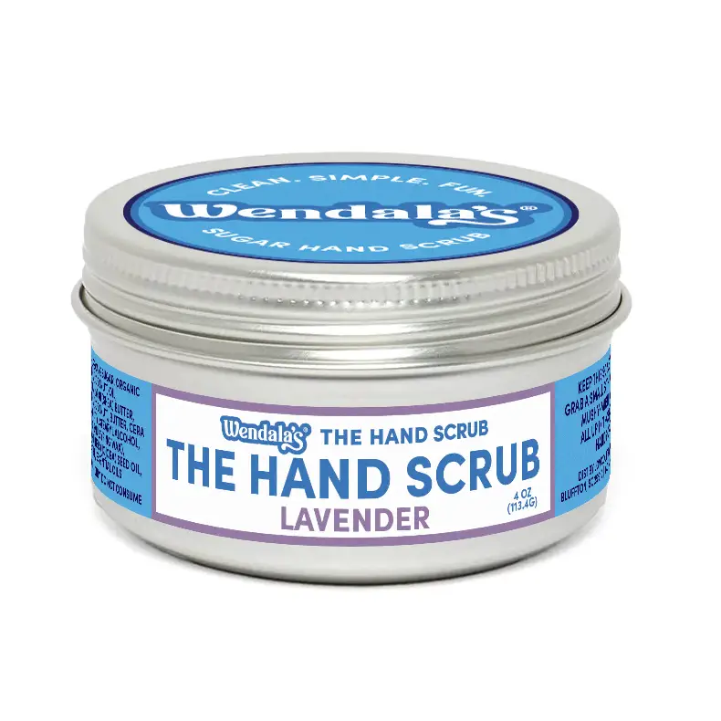 A silver tin of wendalas lavender hand scrub with a blue and white label for gentle exfoliation