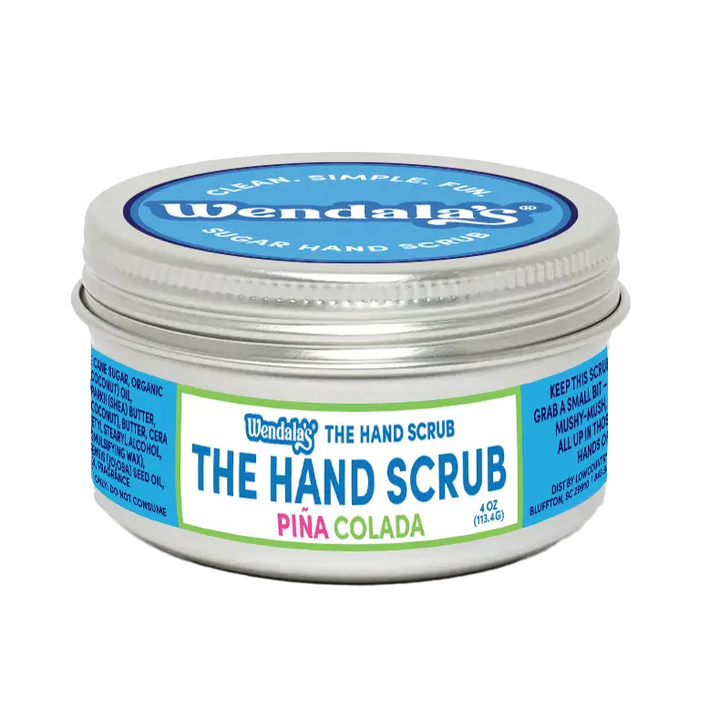 Wendalas pina colada hand scrub in a silver tin with blue and green labeling for exfoliating hands