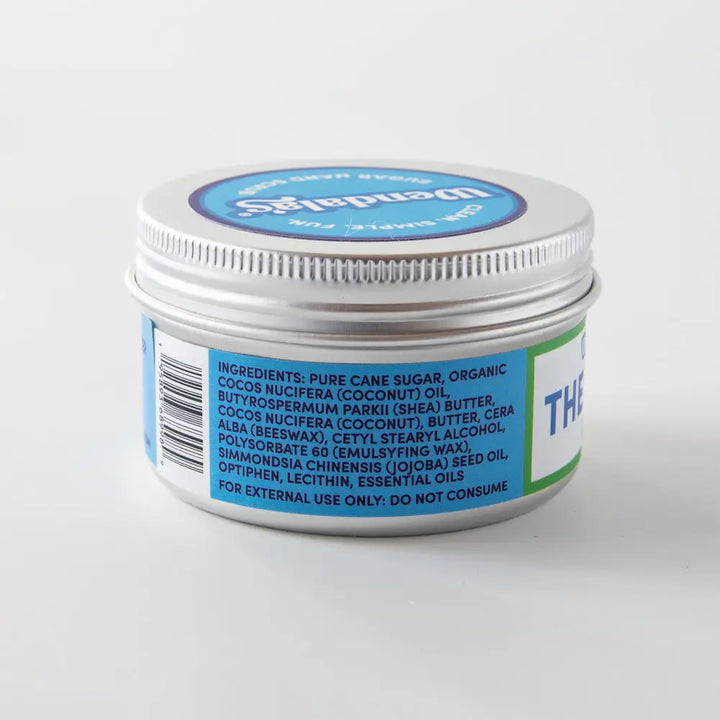 Silver tin hand scrub container with blue and white rosemary mint label featuring wendals brand name on lid