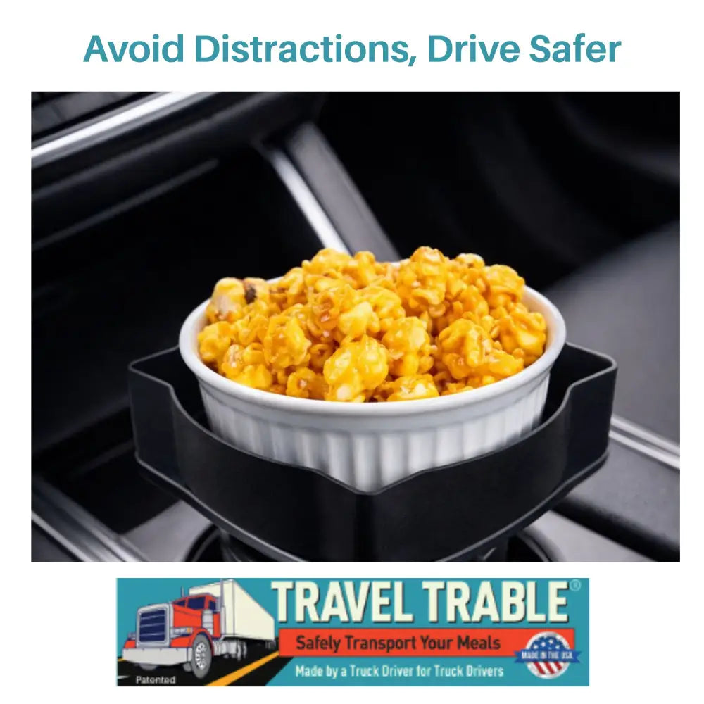 Travel Trable patented food holder with caramel popcorn in standard cup holders