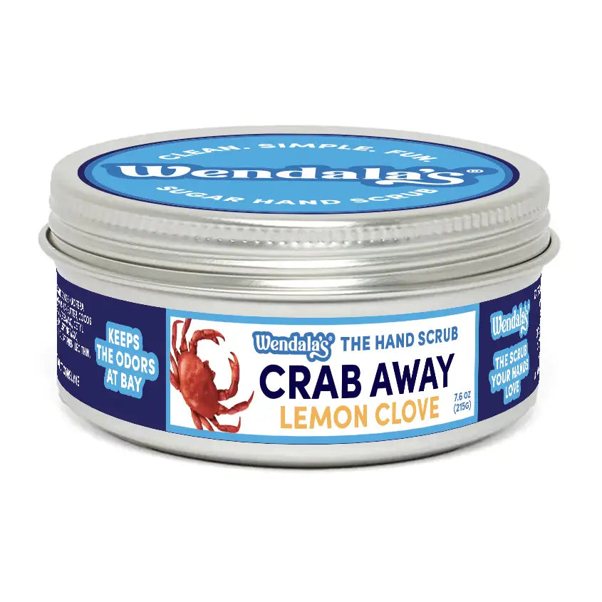 Wendalas crab away lemon clove hand scrub in silver tin with blue white label featuring organic coconut oil and lemon clove