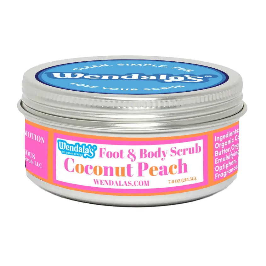 Wendala’s coconut peach foot and body scrub in a silver tin with pink and orange labeling featuring organic coconut butter and unrefined shea butter