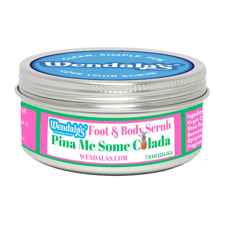 Wendalas foot and body scrub pina me some colada in a silver tin with pink green and white labeling featuring shea butter and organic coconut oil