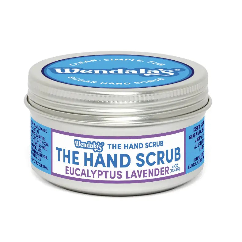 Wendalas hand scrub eucalyptus lavender in a silver tin with blue and white labeling featuring coconut butter and organic coconut oil