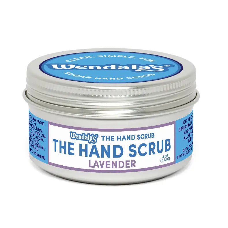 A silver tin of Wendala’s lavender sugar hand scrub with blue and white label for use near bathroom sinks