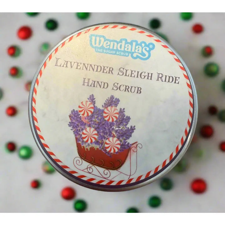 Wendalas lavender sleigh ride sugar scrub in festive tin with lavender and peppermint candy on the lid with shea butter