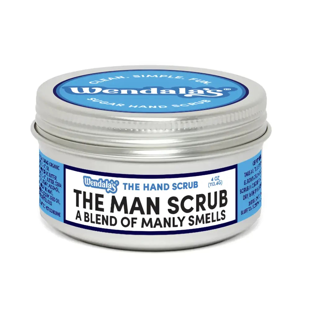 Silver tin container of wendala’s man scrub sugar hand scrub with organic coconut oil and raw sugar in blue label