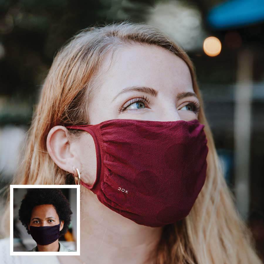 30X Mask, Sangria ear loop mask, worn by a young woman outside, Split Mask Pack