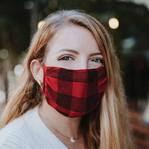 
            
                Load image into Gallery viewer, 30X Mask, red buffalo plaid, ear loop mask, worn by a young woman outside
            
        